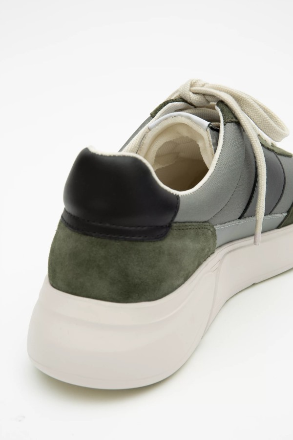 Axel Arigato Donkergroene Genesis Vintage Loper